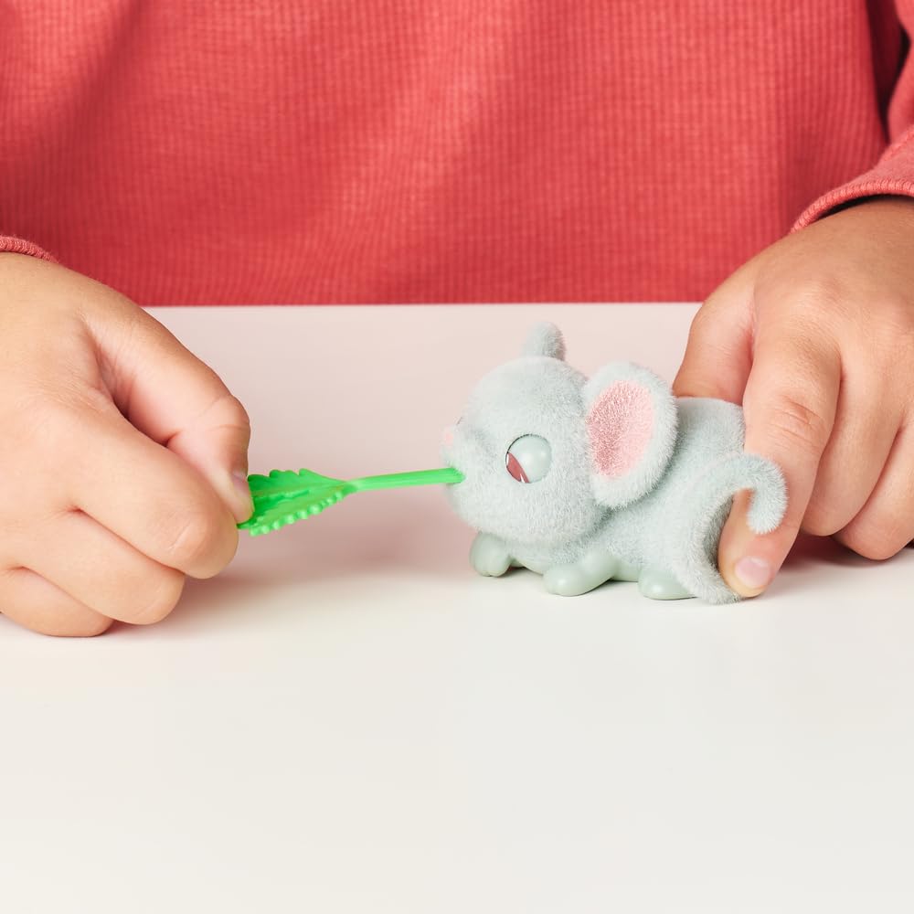 Little Live Pets - Mama Surprise Minis. Feed and Nurture a Lil' Bunny Inside Their Hutch so she can be a Mama. She has 2, 3, or 4 Babies with Surprise Accessories to Dress Up The Babies