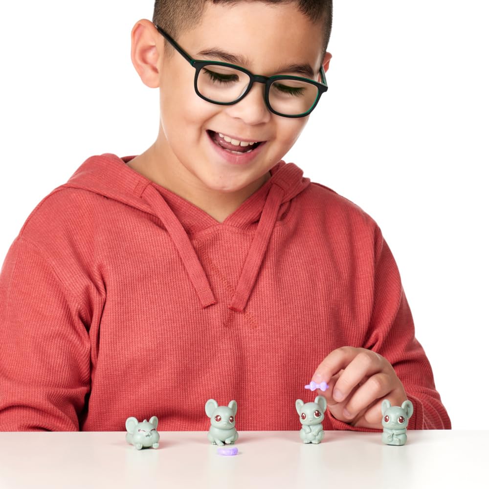 Little Live Pets - Mama Surprise Minis. Feed and Nurture a Lil' Bunny Inside Their Hutch so she can be a Mama. She has 2, 3, or 4 Babies with Surprise Accessories to Dress Up The Babies