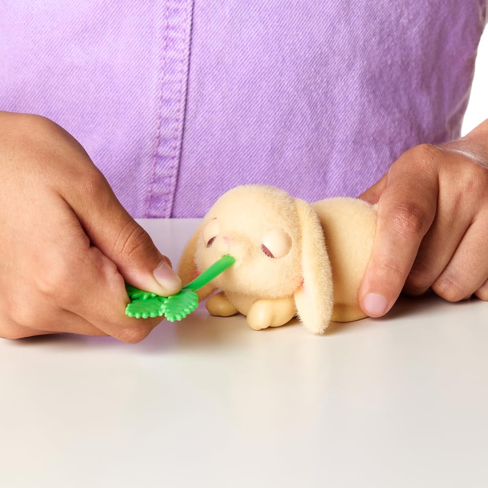 Little Live Pets - Mama Surprise Minis. Feed and Nurture a Lil' Bunny Inside Their Hutch so she can be a Mama. She has 2, 3, or 4 Babies with Surprise Accessories to Dress Up The Babies